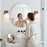 Artcraft Lyndon 1 Light Bathroom Sconce, Black/Brass/Clear