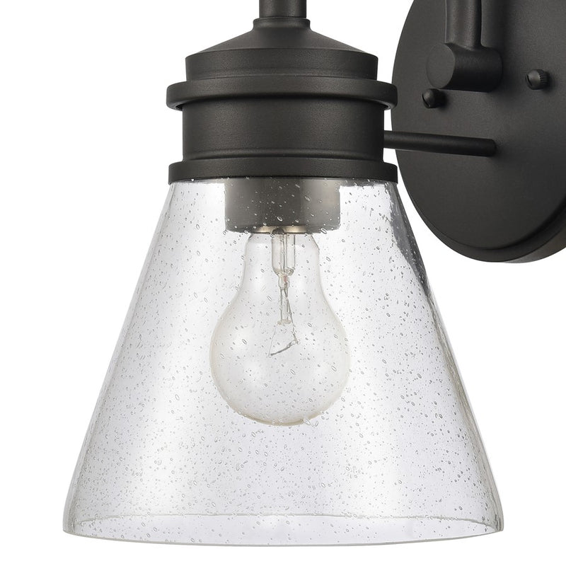 Atlas Lighting Dovas 11.5in 1-Light Outdoor Sconce | Transitional Textured Black and Clear Seeded Glass | Porch & Entryway | Model OL11127-BK