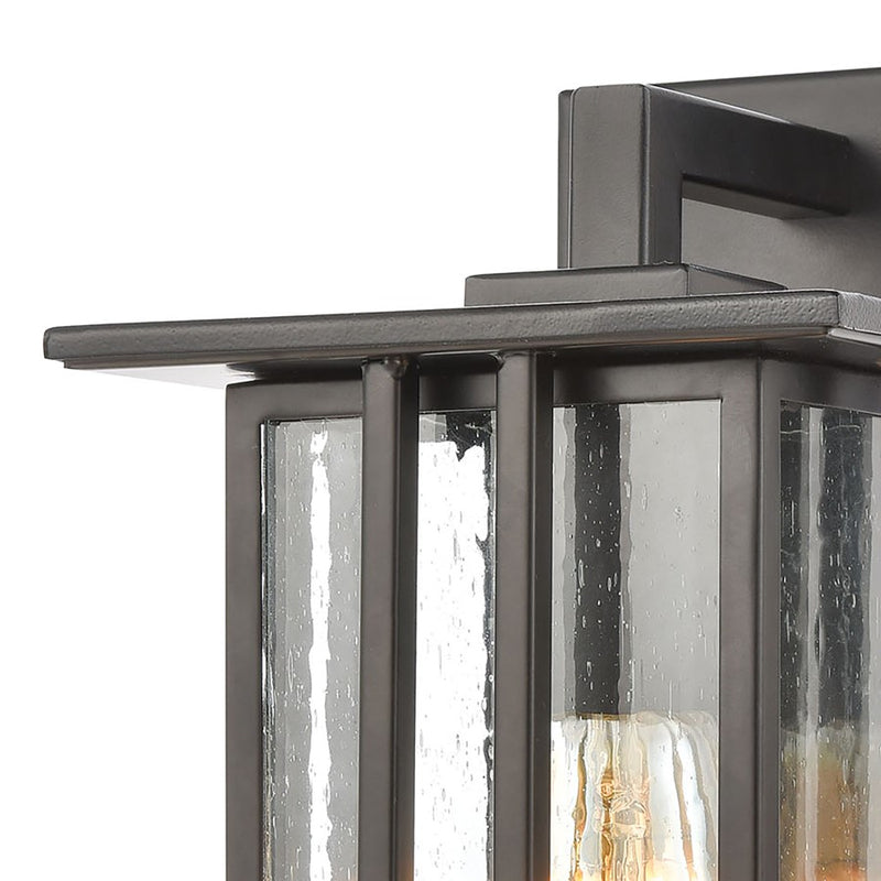 Atlas Lighting Radnor 10in 1-Light Outdoor Sconce | Transitional Matte Black and Clear Seeded Glass | Entryway & Covered Patio | Model OL11210-BK