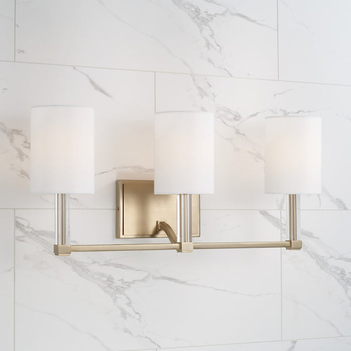 Capital Lighting Ingrid 3 Light Vanity, Brass/White Fabric Shade