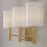 Capital Lighting Adrian 3 Light Vanity, Aged Brass/White Fabric
