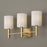Capital Lighting Adrian 3 Light Vanity, Aged Brass/White Fabric