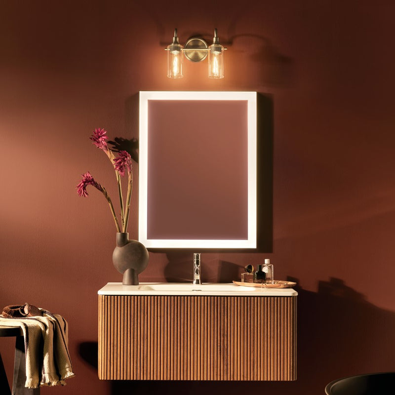 Kichler Kavi 2-Light Bathroom Vanity Light | Modern Champagne Bronze Steel | Clear Glass | Bathroom Vanity & Mirror Lighting | Model 55210CPZ