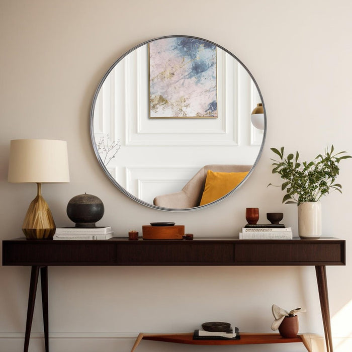 Howard Elliott Steele Polished Silver Round Mirror