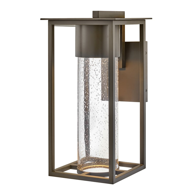 Hinkley Coen 16in 1-Light Outdoor Wall Sconce | Modern Oil Rubbed Bronze Composite and Clear Seedy Glass | Covered Patios & Entryways | Model 17020OZ-LL