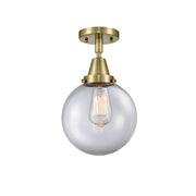Innovations Caden Beacon 1Lt 8" Flush, Antique Brass/Clear - 447-1C-AB-G202-8