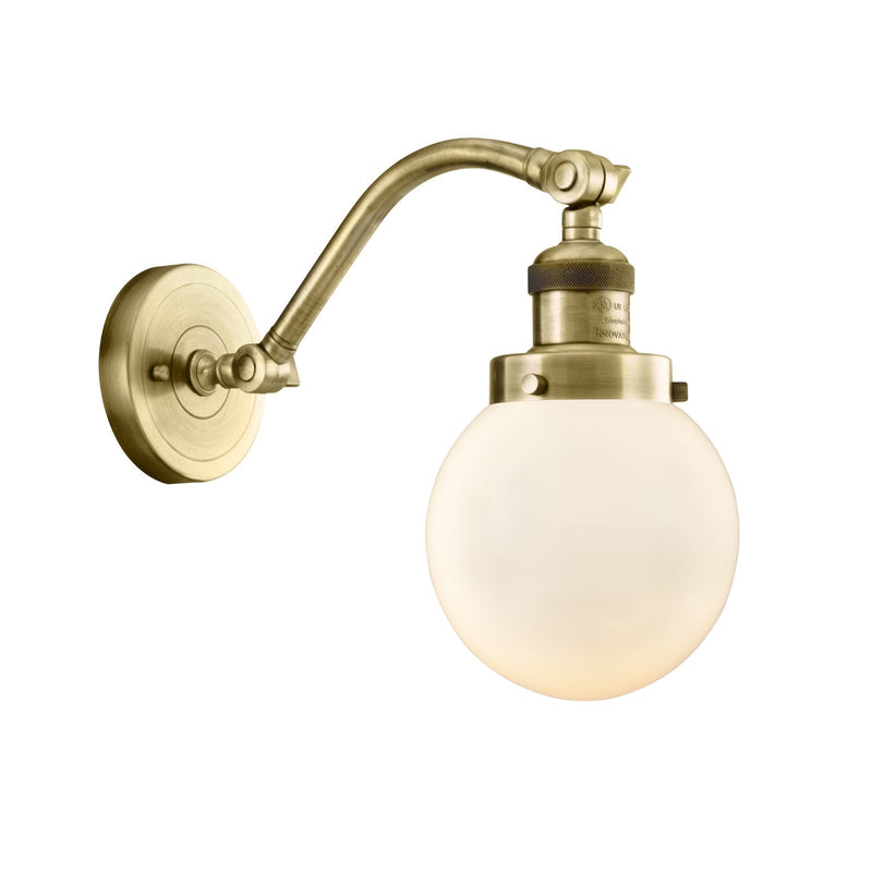 Innovations Beacon 6in 1-Light Wall Sconce | Industrial Antique Brass and Matte White Glass | Bedroom & Hallway Accent | Model 515-1W-AB-G201-6