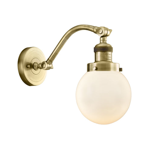 Innovations Beacon 6in 1-Light Wall Sconce | Industrial Antique Brass and Matte White Glass | Bedroom & Hallway Accent | Model 515-1W-AB-G201-6
