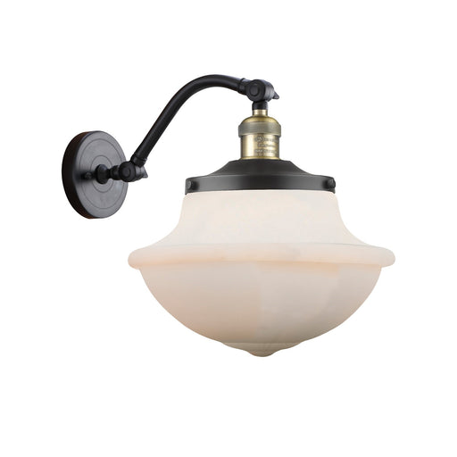 Innovations Oxford 11.75in 1-Light Wall Sconce | Industrial Black Antique Brass and Matte White Glass | Bedroom & Hallway | Model 515-1W-BAB-G541