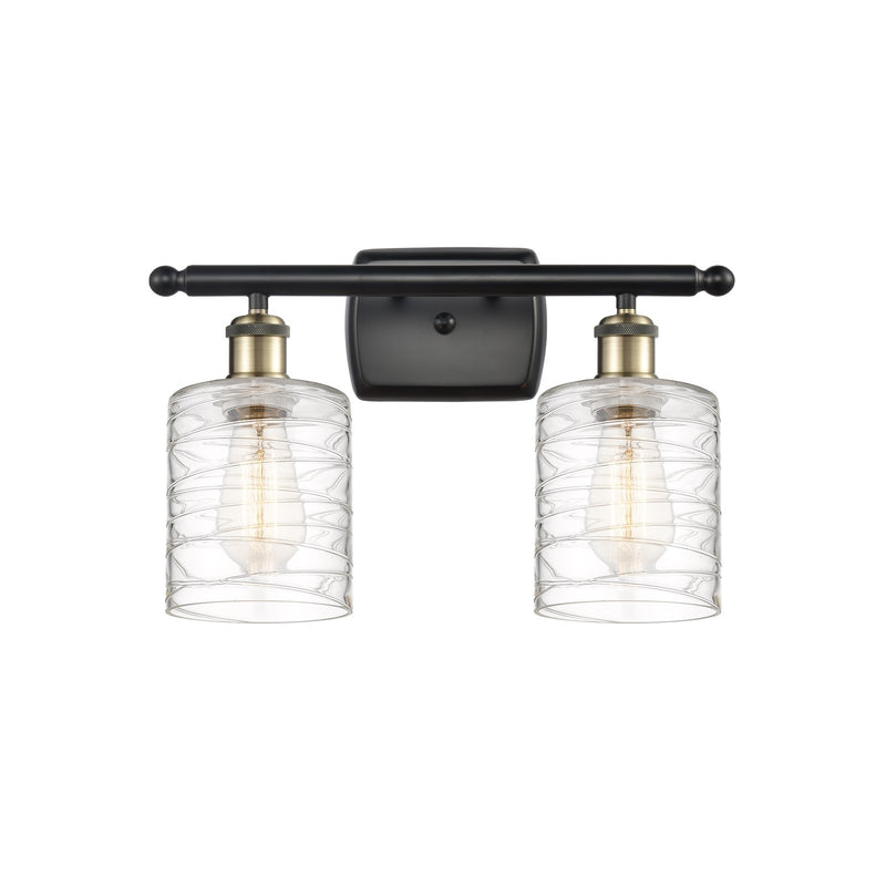 Innovations Lighting Cobbleskill 15in 2-Light Bath Vanity Light | Art Nouveau Black Antique Brass and Deco Swirl Glass | Model 516-2W-BAB-G1113-LED