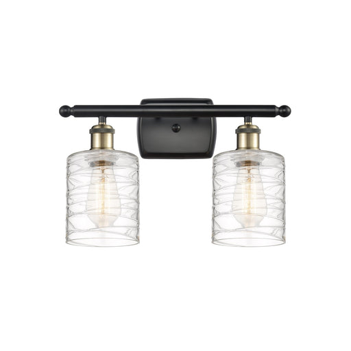 Innovations Lighting Cobbleskill 15in 2-Light Bath Vanity Light | Art Nouveau Black Antique Brass and Deco Swirl Glass | Model 516-2W-BAB-G1113-LED