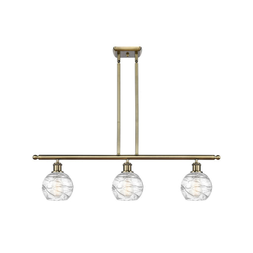 Innovations Athens Deco Swirl 36in 3-Light Island | Industrial Antique Brass and Clear Glass | Kitchen Island & Dining | Model 516-3I-AB-G1213-6CL