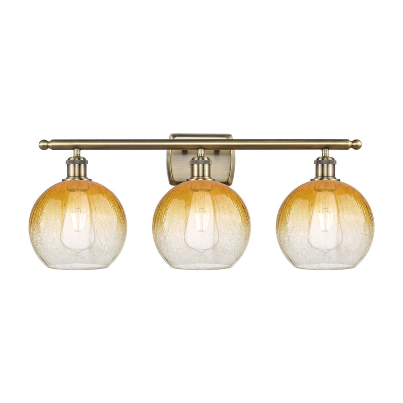 Innovations Brookhaven Globe 28in 3-Light Bath Vanity Light | Industrial Antique Brass and Amber Glass | Bathroom Vanity | Model 516-3W-AB-G483-8AM