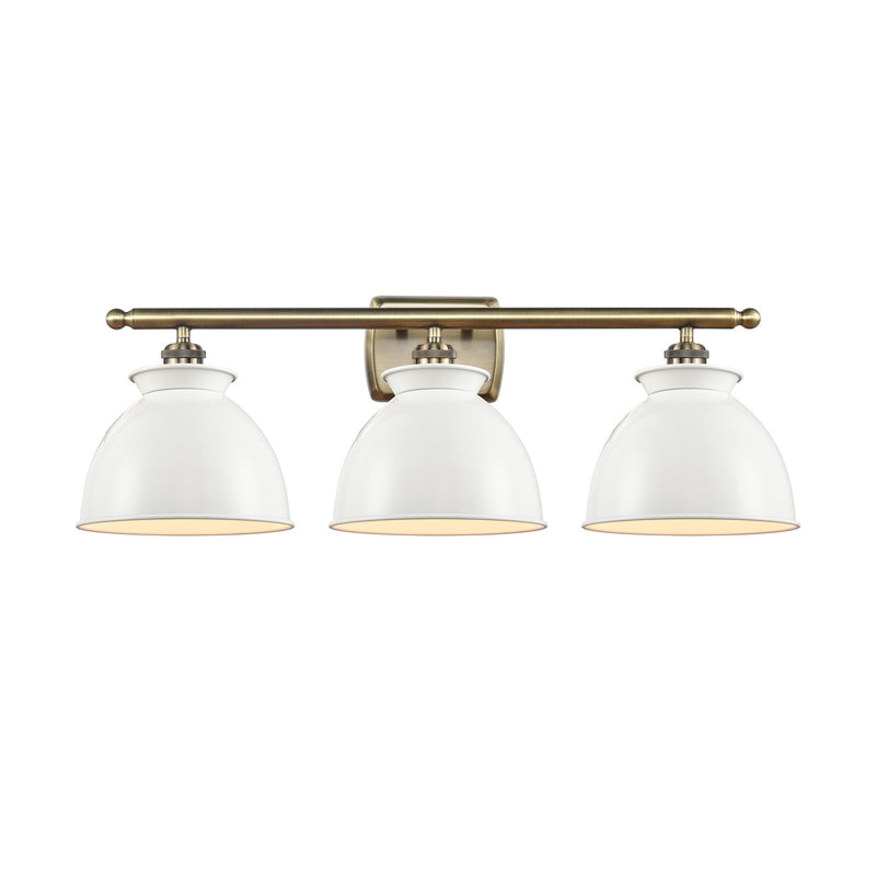 Innovations Adirondack 28in 3-Light Bath Vanity | Industrial Farmhouse Antique Brass Steel and Glossy White Metal Shade | Bathroom | Model 516-3W-AB-M14-W