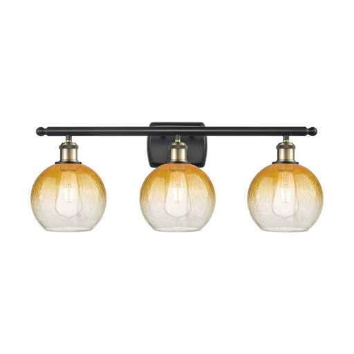 Innovations Brookhaven Globe 28in 3-Light Bath Vanity Light | Industrial Black Antique Brass and Amber Glass | Bathroom Vanity | Model 516-3W-BAB-G483-8AM