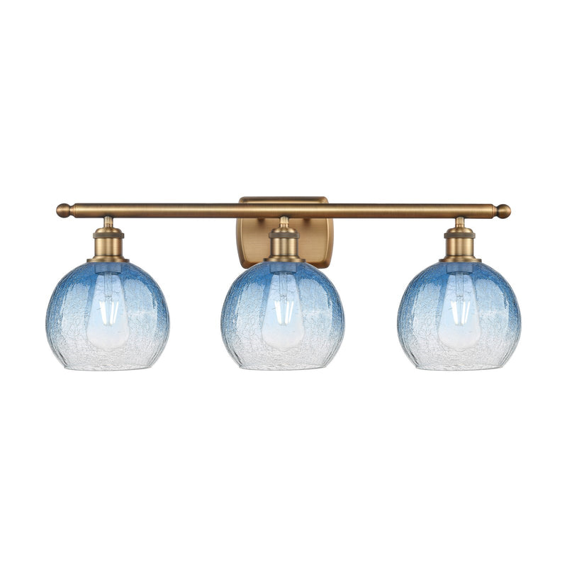 Innovations Brookhaven Globe 28in 3-Light Bath Vanity Light | Industrial Brushed Brass and Sapphire Blue Glass | Bathroom | Model 516-3W-BB-G483-8SB
