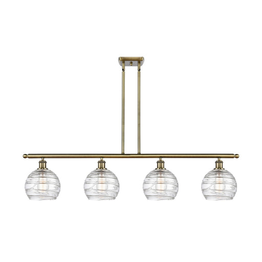 Innovations Athens Deco Swirl 48in 4-Light Island Light | Industrial Antique Brass and Clear Deco Swirl Glass | Kitchen Island | Model 516-4I-AB-G1213-8CL