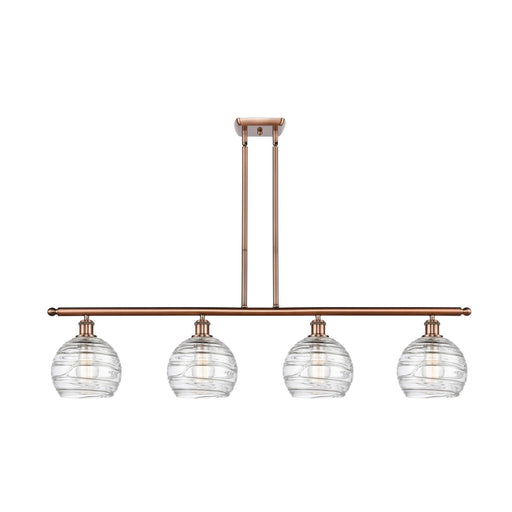 Innovations Athens Deco Swirl 48in 4-Light Island Light | Industrial Antique Copper Steel and Clear Deco Swirl Glass | Kitchen | Model 516-4I-AC-G1213-8CL