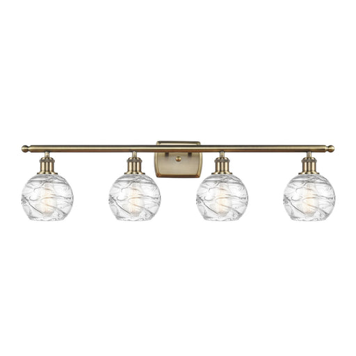 Innovations Athens Deco Swirl 36in 4-Light Bath Vanity Light | Industrial Antique Brass and Clear Glass | Bathroom Vanity | Model 516-4W-AB-G1213-6CL