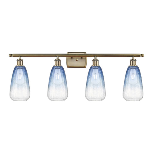 Innovations Brookhaven Almond 36in 4-Light Bath Vanity Light | Industrial Antique Brass and Sapphire Blue Glass | Bathroom | Model 516-4W-AB-G480-6SB