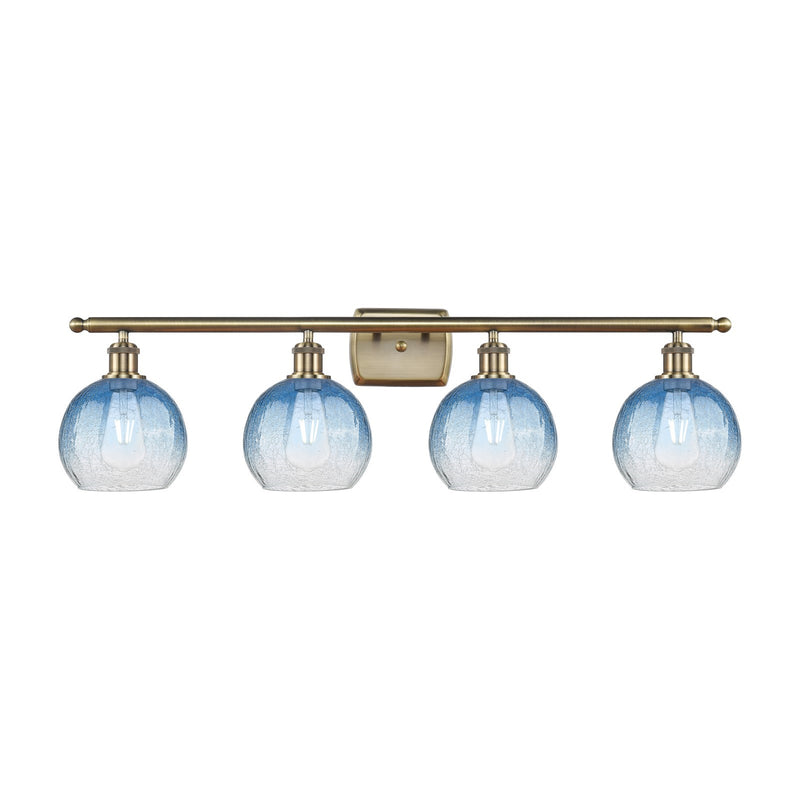 Innovations Brookhaven Globe 38in 4-Light Bath Vanity Light | Industrial Antique Brass Steel and Sapphire Blue Glass | Bathroom | Model 516-4W-AB-G483-8SB