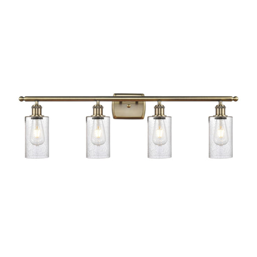 Innovations Clymer 34in 4-Light Bath Vanity Light | Art Nouveau Antique Brass Steel and Seedy Glass | Bathroom Vanity | 34 x 10 x 6 | Model 516-4W-AB-G804