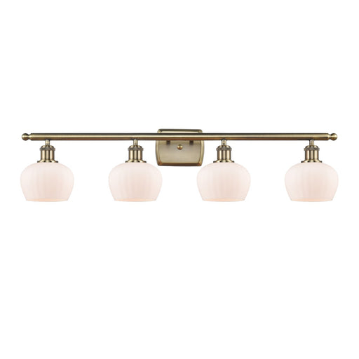 Innovations Fenton 36.5in 4-Light Bath Vanity Light | Industrial Antique Brass Steel and Matte White Ribbed Glass | Bathroom Vanity | Model 516-4W-AB-G91