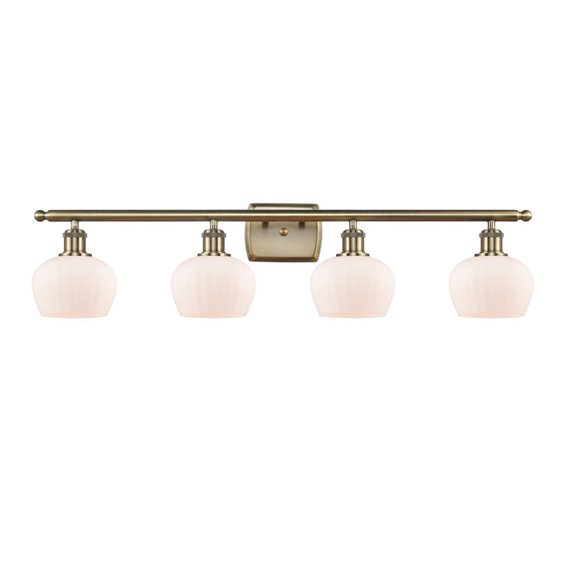 Innovations Fenton 36.5in 4-Light Bath Vanity Light | Industrial Antique Brass Steel and Matte White Ribbed Glass | Bathroom Vanity | Model 516-4W-AB-G91