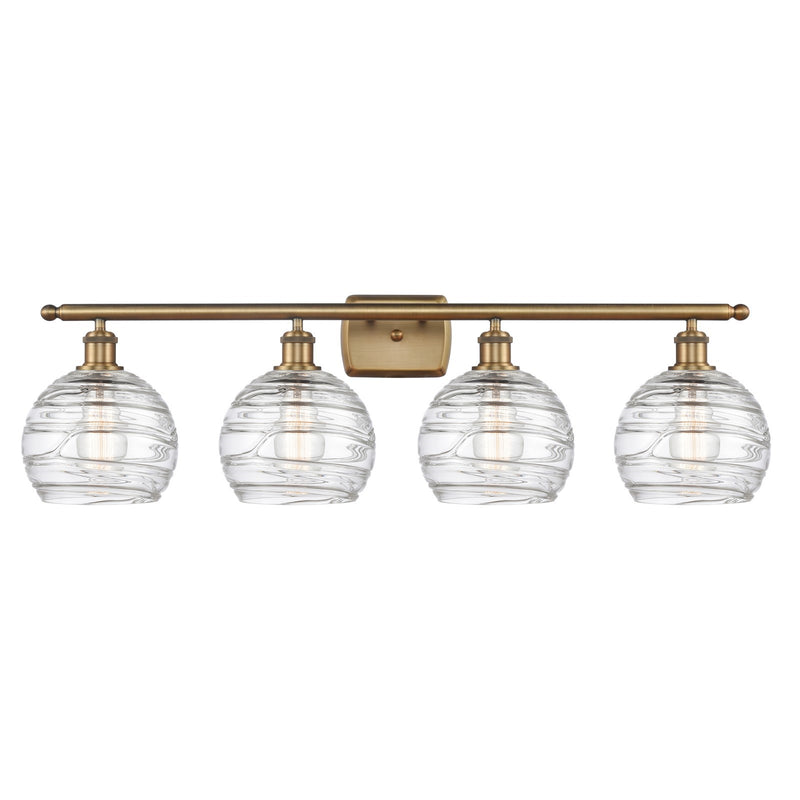 Innovations Athens Deco Swirl 38in 4-Light Bath Vanity Light | Industrial Brushed Brass and Clear Deco Swirl Glass | Bathroom | Model 516-4W-BB-G1213-8CL