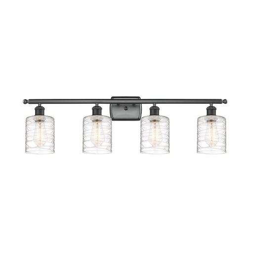 Innovations Cobbleskill 35in 4-Light Bath Vanity | Art Nouveau Industrial Matte Black Steel and Deco Swirl Clear Glass | Bathroom | Model 516-4W-BK-G1113