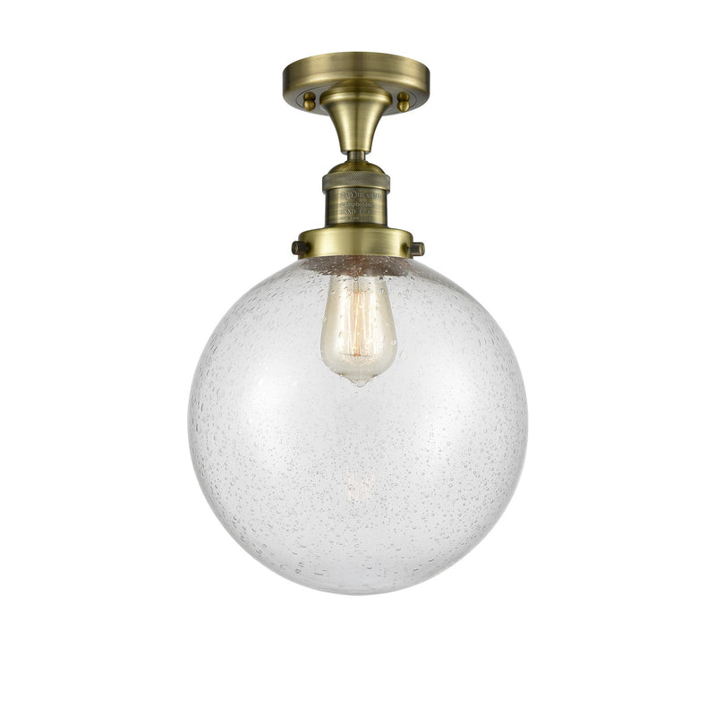 Innovations Beacon 10in 1-Light Semi-Flush Mount | Industrial Antique Brass and Seedy Glass | Hallway & Bathroom | 10 x 10 x 13 | Model 517-1CH-AB-G204-10