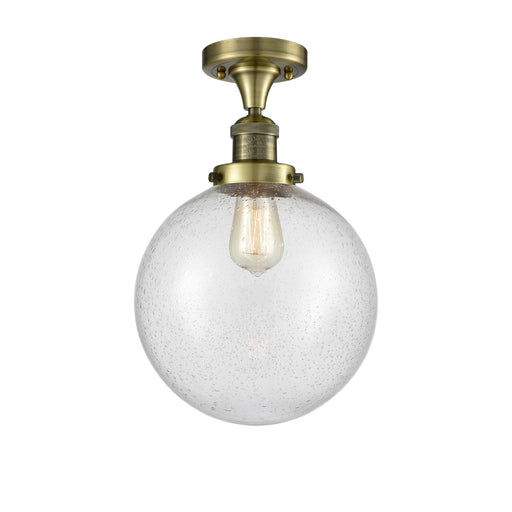 Innovations Beacon 10in 1-Light Semi-Flush Mount | Industrial Antique Brass Steel and Seedy Glass | Damp-Rated Entryway & | Model 517-1CH-AB-G204-10-LED