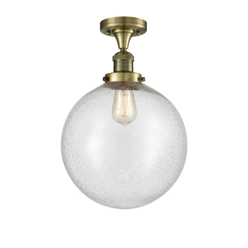 Innovations Beacon 12in 1-Light Semi-Flush Mount | Industrial Antique Brass Steel and Seedy Glass | Damp-Rated Entryway & | Model 517-1CH-AB-G204-12-LED