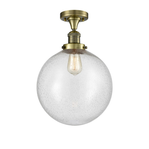 Innovations Beacon 12in 1-Light Semi-Flush Mount | Industrial Antique Brass Steel and Seedy Glass | Damp-Rated Entryway & | Model 517-1CH-AB-G204-12-LED
