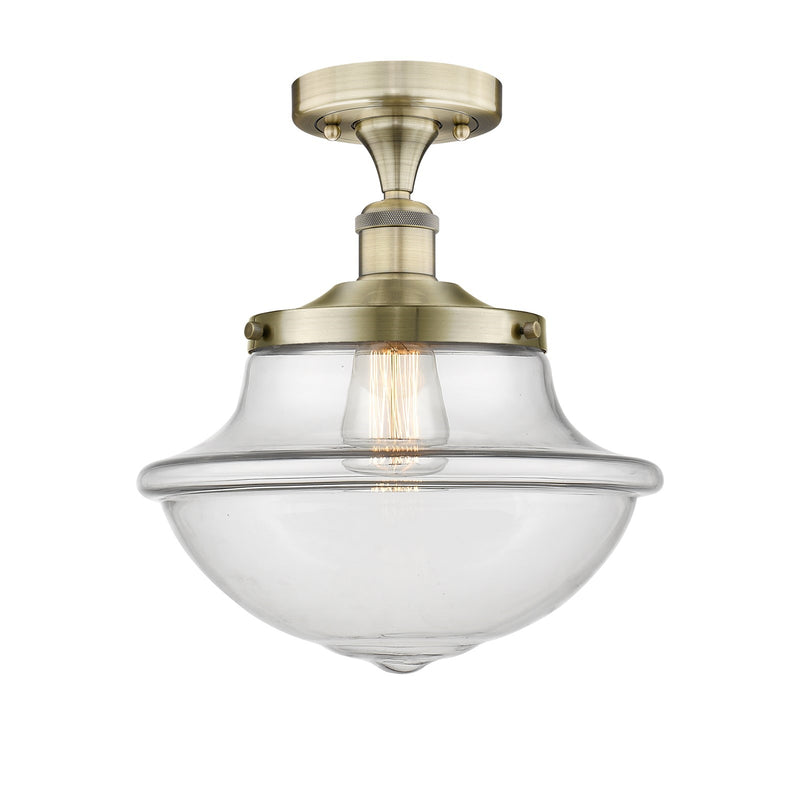 Innovations Oxford 12in 1-Light Semi-Flush Mount | Industrial Antique Brass and Clear Glass | Kitchen & Hallway | 11.75 x 13.12 in | Model 616-1F-AB-G542