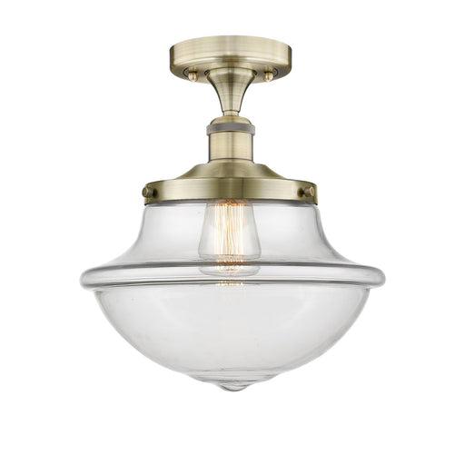 Innovations Oxford 12in 1-Light Semi-Flush Mount | Industrial Antique Brass and Clear Glass | Kitchen & Hallway | 11.75 x 13.12 in | Model 616-1F-AB-G542