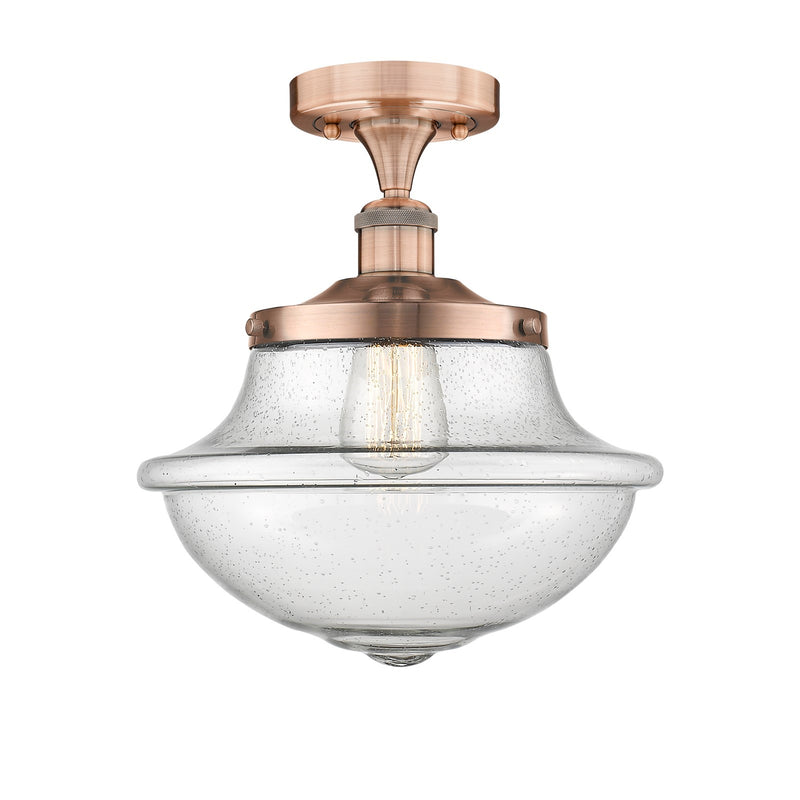 Innovations Oxford 12in 1-Light Semi-Flush Mount | Industrial Antique Copper Steel and Seedy Glass | Kitchen & Hallway | 11.75 x | Model 616-1F-AC-G544