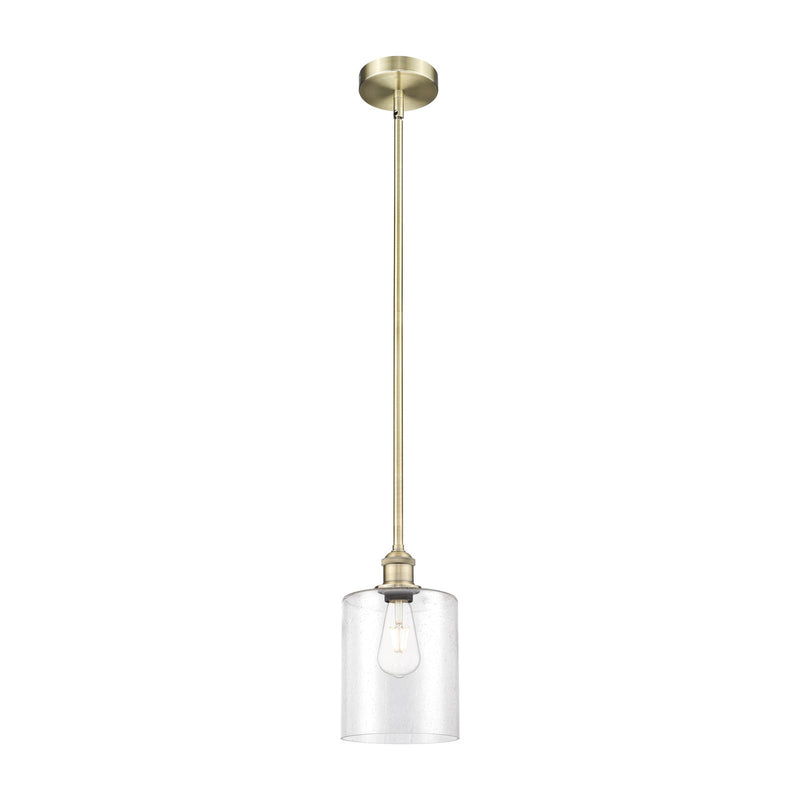 Innovations Paladin 7in 1-Light Mini Pendant | Farmhouse Antique Brass Steel and Seedy Glass Cylinder | Kitchen Island & Dining | Model 616-1S-AB-G4424-7