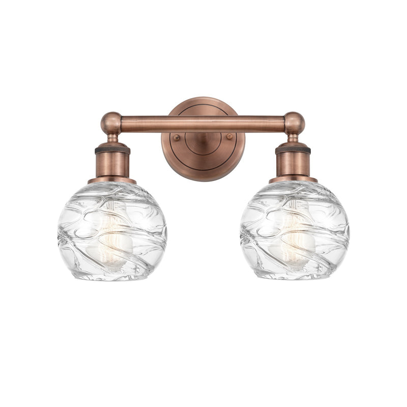 Innovations Athens Deco Swirl 15in 2-Light Bath Vanity Light | Industrial Antique Copper and Clear Glass | Damp Rated Bathroom | Model 616-2W-AC-G1213-6CL