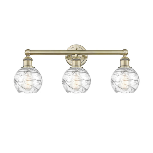 Innovations Athens Deco Swirl 24in 3-Light Bath Vanity | Industrial Antique Brass Steel and Clear Deco Swirl Glass | Bathroom | Model 616-3W-AB-G1213-6CL