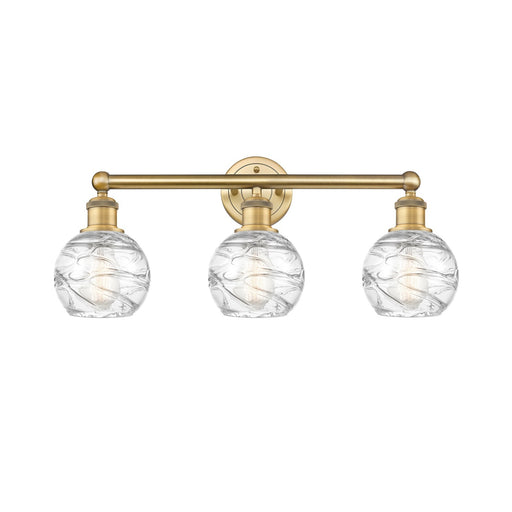 Innovations Athens Deco Swirl 24in 3-Light Bath Vanity Light | Industrial Brushed Brass and Clear Deco Swirl Glass | Bathroom | Model 616-3W-BB-G1213-6CL
