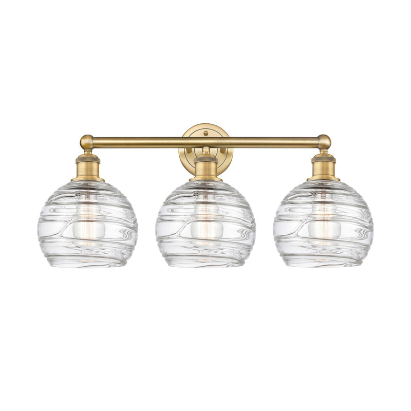 Innovations Athens Deco Swirl 26in 3-Light Bath Vanity | Industrial Brushed Brass Steel and Clear Deco Swirl Glass | Bathroom | Model 616-3W-BB-G1213-8CL