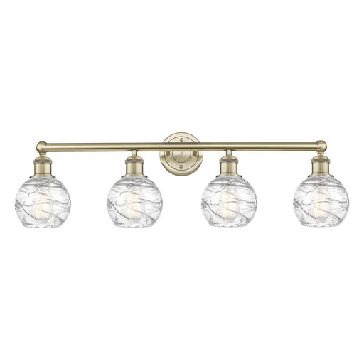 Innovations Athens Deco Swirl 33in 4-Light Bath Vanity Light | Industrial Antique Brass Steel and Clear Deco Swirl Glass | Model 616-4W-AB-G1213-6CL