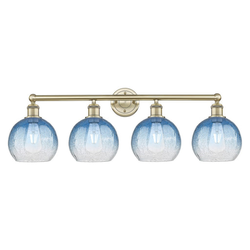 Innovations Brookhaven Globe 35in 4-Light Bath Vanity Light | Industrial Antique Brass and Sapphire Blue Glass | Bathroom | Model 616-4W-AB-G483-8SB