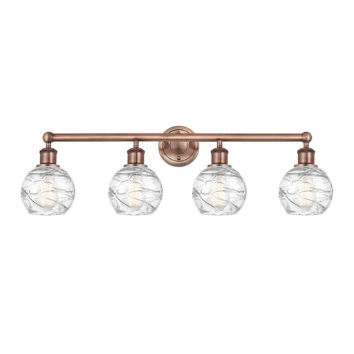 Innovations Athens Deco Swirl 33in 4-Light Bath Vanity Light | Industrial Antique Copper Steel and Clear Deco Swirl Glass | Model 616-4W-AC-G1213-6CL