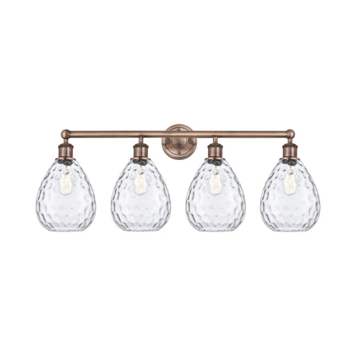 Innovations Waverly 35in 4-Light Bath Vanity Light | Industrial Antique Copper Steel and Clear Glass | Damp Rated Bathroom Vanity | Model 616-4W-AC-G372