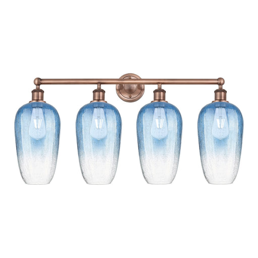Innovations Brookhaven Flute 34in 4-Light Bath Vanity Light | Industrial Antique Copper and Sapphire Blue Glass | Bathroom | Model 616-4W-AC-G484-7SB