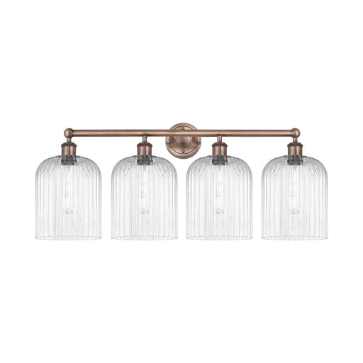 Innovations Bridal Veil 32in 4-Light Bath Vanity Light | Art Nouveau Industrial Antique Copper and Clear Ribbed Glass | Damp | Model 616-4W-AC-G559-8CL