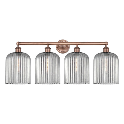 Innovations Bridal Veil 32in 4-Light Bath Vanity Light | Art Nouveau Industrial Antique Copper Steel and Light Smoke Ribbed | Model 616-4W-AC-G559-8SM