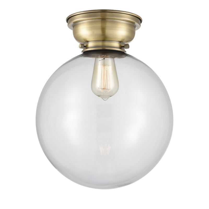 Innovations Beacon 12in 1-Light Flush Mount | Industrial Antique Brass and Clear Glass | Bedroom & Hallway | 12 x 12 x 14.75 | Model 623-1F-AB-G202-12-LED